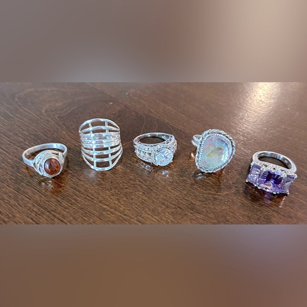 925 Sterling silver 5 rings, different sizes.
